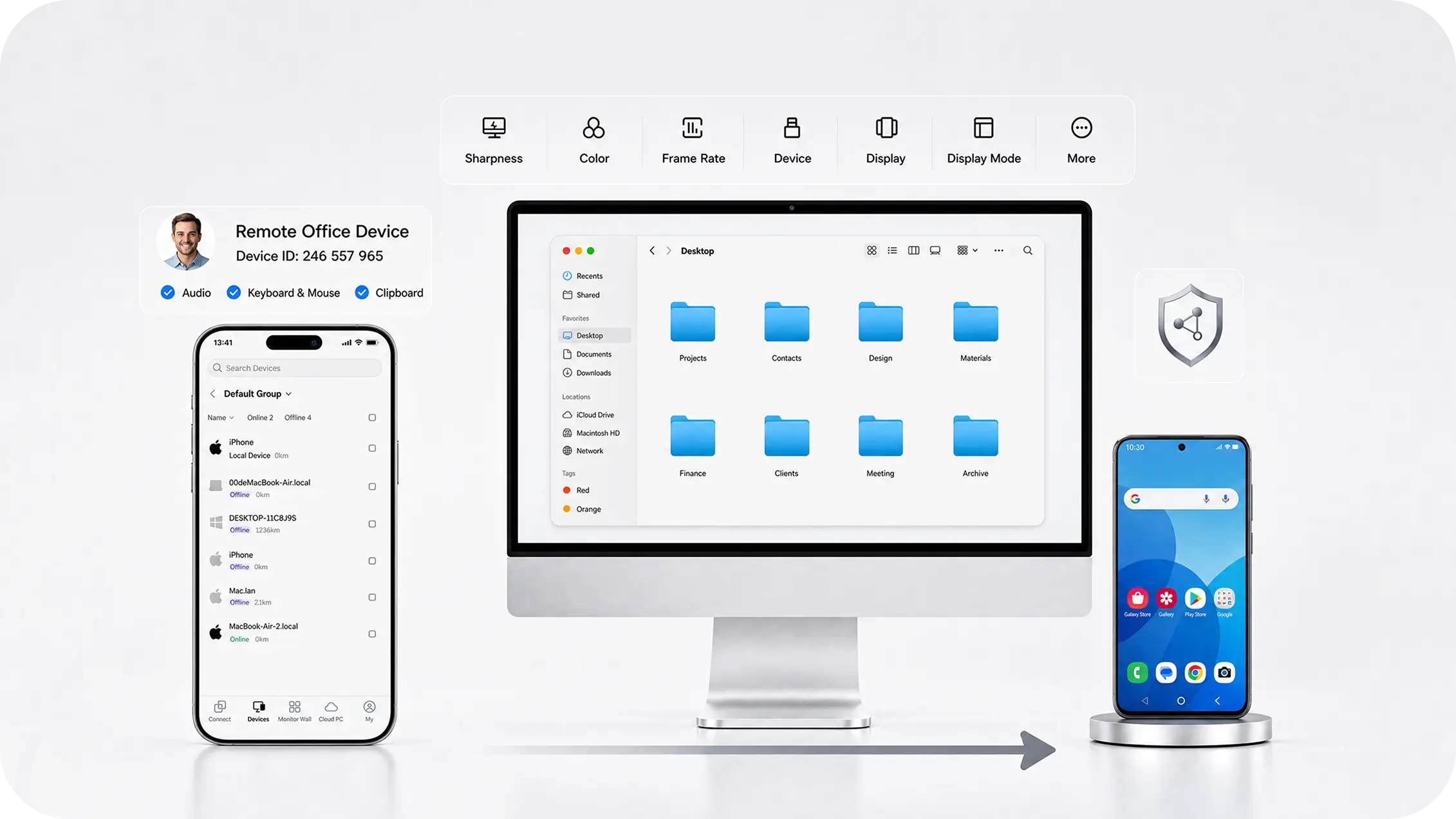 A smartphone remotely connecting to an office computer with a file manager displayed on the desktop monitor